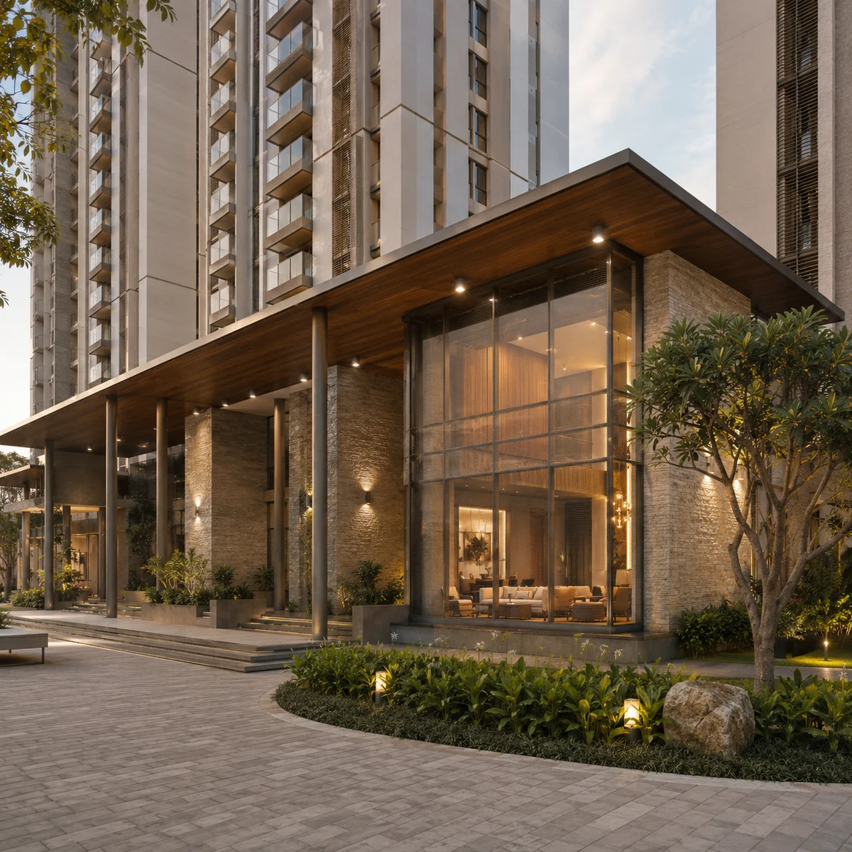 Modern Spaaces Sarjapur Road indicative arrival pavilion at a tower base with a timber-soffit porte-cochere and double-height glazed lounge Modern Spaaces Sarjapur Road indicative arrival pavilion at a tower base with a timber-soffit porte-cochere and double-height glazed lounge
